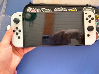 Nintendo Switch OLED Blanca + muchos accesorios