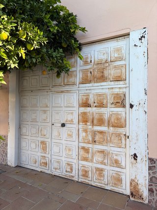 Cancelación Puerta Garaje Metálica