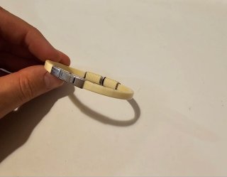 Bracciale in caucciù beige