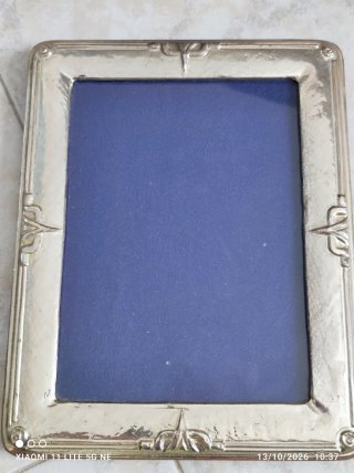 Cornice in argento
