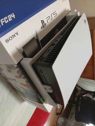 PS5 + base di ricarica e raffreddamento + gioco