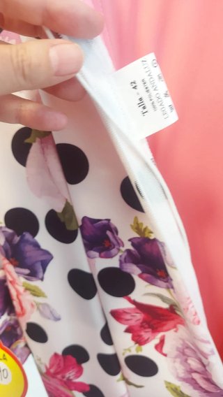 Traje de flamenca blanco y rosa