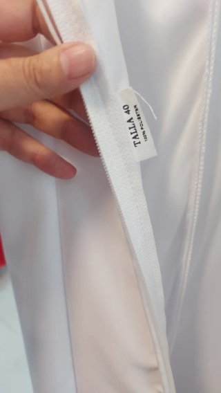 Traje de flamenca blanco con volantes