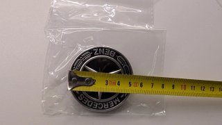 Emblema trasero A45S negro brillo y logo Mercedes