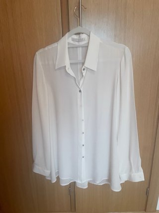 Blusa blanca elegante