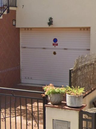 Puerta de garaje/local oscilante