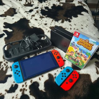 Nintendo Switch + Animal Crossing: New Horizons + accessori