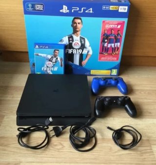 PS4 Slim 1TB FIFA 19 + 2 Mando prácticamente nueva