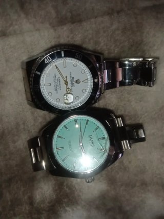 Relojes Rolex y Boss