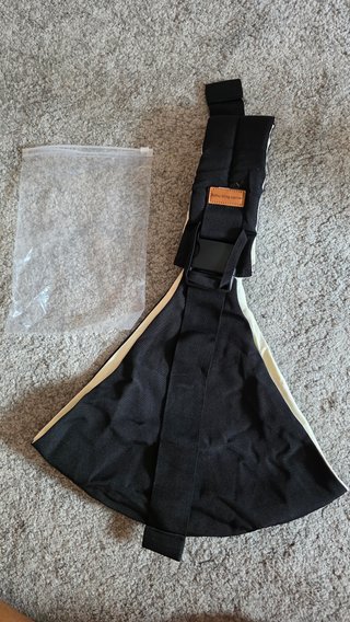 Porta-bebe lateral - Preto (novo, nunca usado)