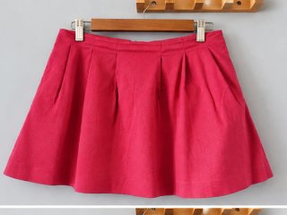 Falda Zara rosa fucsia plisada