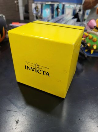 Caja de Reloj Invicta Amarilla mujer