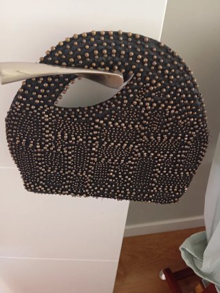 Bolso de fiesta negro y dorado