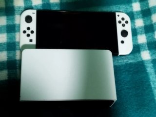 Nintendo Switch OLED + Super Mario Bros. Wonder