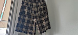 Pantalón corto cuadros beige y negro