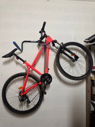 Bicicleta de montaña B’Twin 26 roja con suspensión