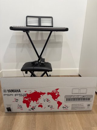 Teclado Yamaha PSR-F52 con soporte y banqueta