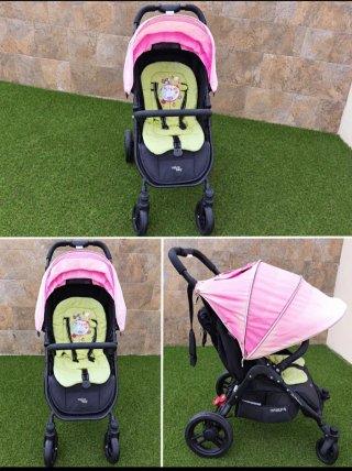 Silla de paseo ligera rosa y negra