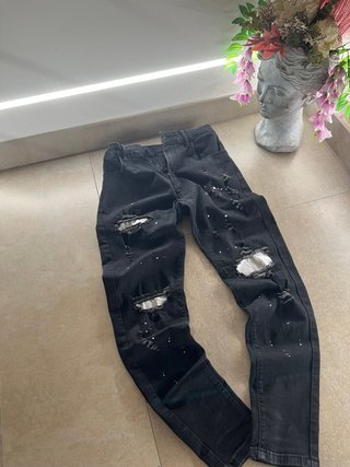 Jeans slim fit strappati neri come nuovi