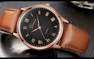 Reloj Elegance negro y oro rosa con correa marrón
