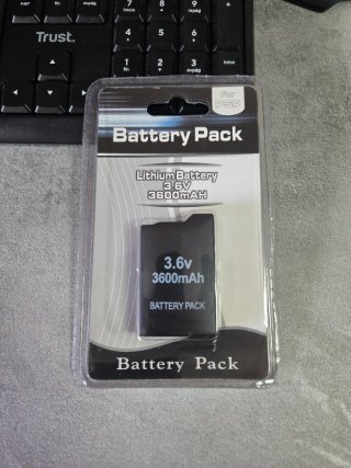 CARICATORE + BATTERIA PSP 1004