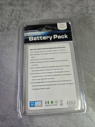 CARICATORE + BATTERIA PSP 1004