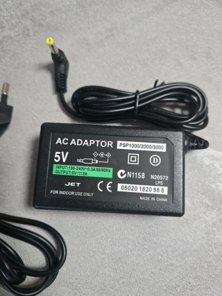 CARICATORE + BATTERIA PSP 1004