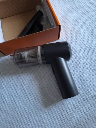 Mini aspirador portátil
