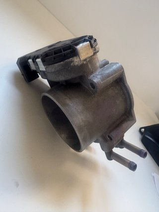 Cuerpo de mariposa para Audi A6
