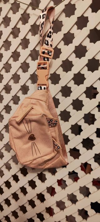 Mochila rosa con estampado de leopardo