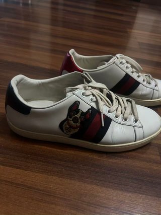 Zapatillas Gucci Ace bordado perro piel blanca