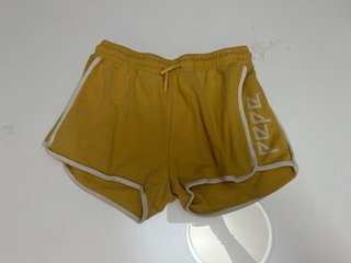 Pantalón corto de chándal mostaza