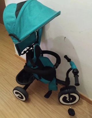 Triciclo infantil color turquesa