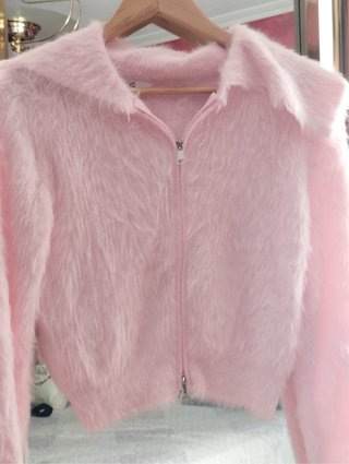 Chaqueta rosa peluda con cremallera