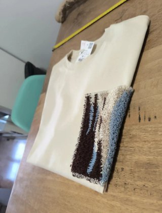 Camiseta Zara con bolsillo de fantasía