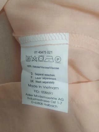 Blusa fluída color salmón talla 40