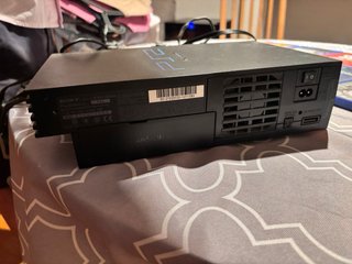 Console PlayStation 2 con 11 giochi e 2 controller