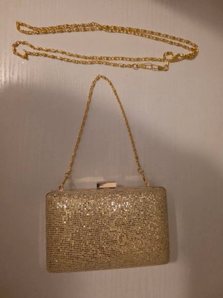 Bolso de fiesta rígido dorado