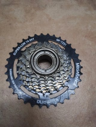 Piñón Shimano Megarange 7v 14-34T