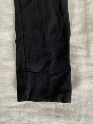 Mono negro tipo media talla única