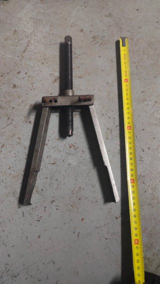 Extractor de dos garras