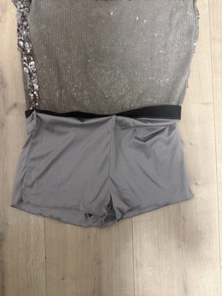 Falda  pantalón Bershka lentejuelas plateadas