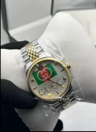 Reloj Gucci Oro y Plata