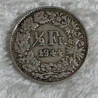 Moneda suiza de medio franco de plata 1944