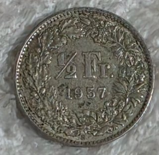 Moneda suiza de medio franco de plata 1957
