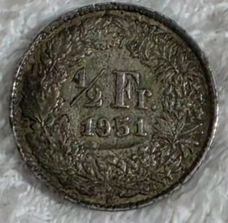 Moneda suiza de medio franco de plata 1951
