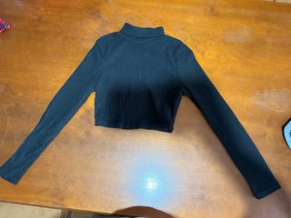 Top negro cuello alto manga larga