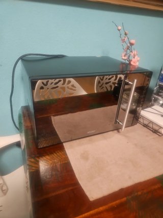 Microondas Koenic con acabado espejo