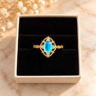 Anillo Dorado con Piedra Turquesa