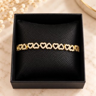 Pulsera de corazones dorada
